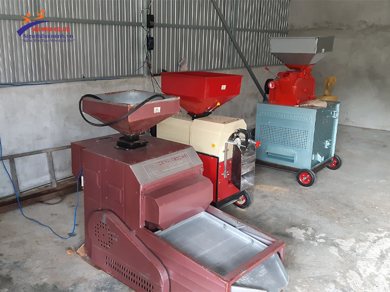 bàn giao bộ máy xát gạo